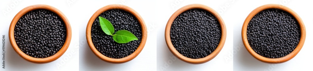 Four bowls of black sesame seeds, one with sprout. Four bowls of black sesame seeds, one with sprout.