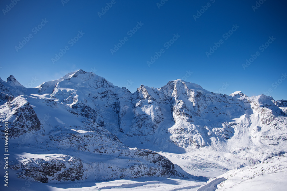 Fototapeta premium Switzerland Bernina Diavolezza perennial glacier, in winter with snow, Bernina train route. Piz Bernina.