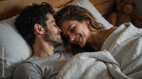 Valentine's day. Couple of lovers lying in bed, family, love, romance, passion. Beautiful man and woman, guy and girl, day off, sex life, date, relationship, time together
