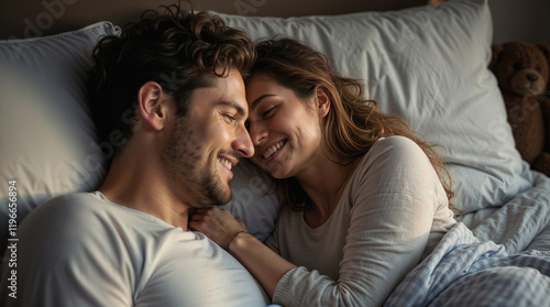 Valentine's day. Couple of lovers lying in bed, family, love, romance, passion. Beautiful man and woman, guy and girl, day off, sex life, date, relationship, time together