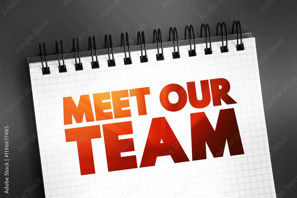 Fototapeta premium Meet Our Team text on notepad, concept background