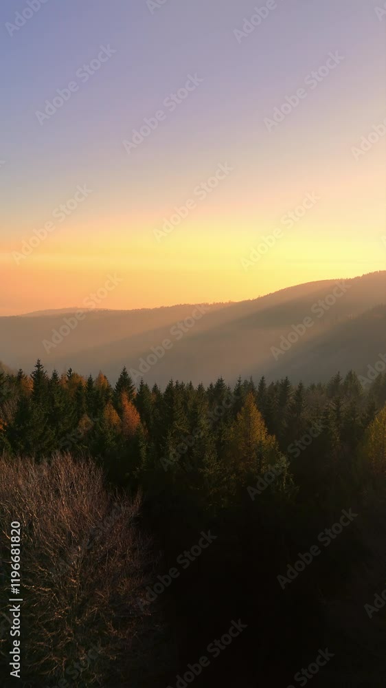Aerial Cinematic View of Autumn Sunset Over Misty Forest in Mountains, Czech Republic Aerial Cinematic View of Autumn Sunset Over Misty Forest in Mountains, Czech Republic