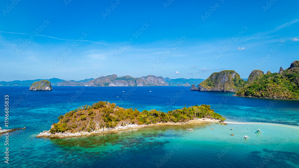 Aerail view of tropical exotic island sand bar separating sea in two with turquoise in El Nido, Palawan, Philippines. Aerail view of tropical exotic island sand bar separating sea in two with turquoise in El Nido, Palawan, Philippines.