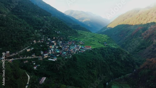 4K Aerial View of Bantoc's Bayyo Rice Terraces,  Philippines.
Soar above these breathtaking rice fields, carved into the mountainside by generations of Ifugao farmers. photo