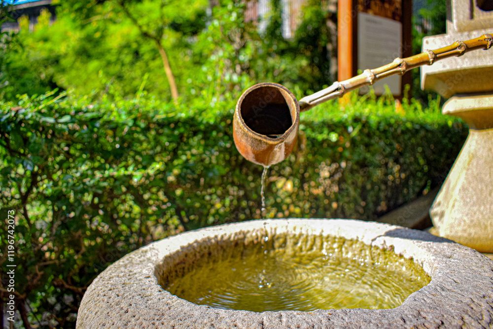 The photograph captures the serene ambiance of a traditional Japanese rock garden. The photograph captures the serene ambiance of a traditional Japanese rock garden.