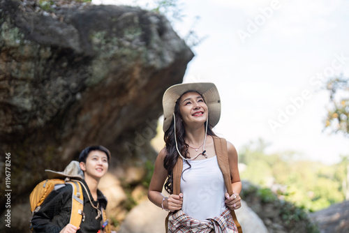 LGBT couple hiking together, enjoying the beautiful outdoors and nature photo