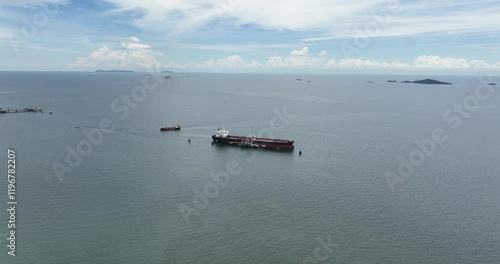 Industrial ship in the ocean in Thailand. Commercial industrial shipping. Aerial drone view. photo