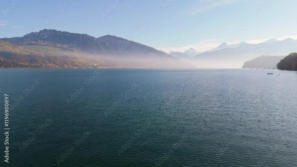 Close Droneflight over the lake Thun with the mountainscape in the background. Close Droneflight over the lake Thun with the mountainscape in the background.