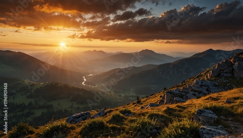 sunset in the mountains . A scenic mountain range at sunset . The sun casts an orange glow over the valley.