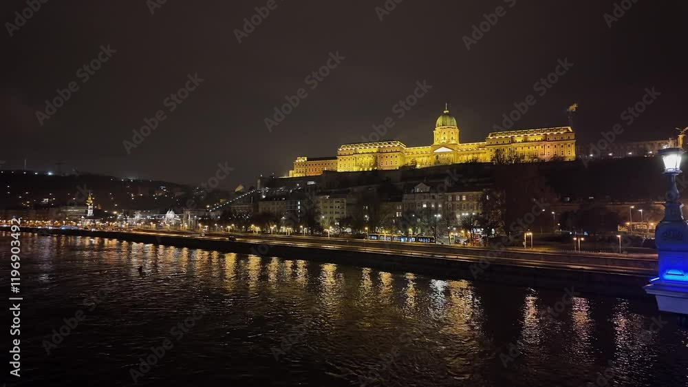 Lights suddenly go out on Buda Castle across Danube River at night Lights suddenly go out on Buda Castle across Danube River at night