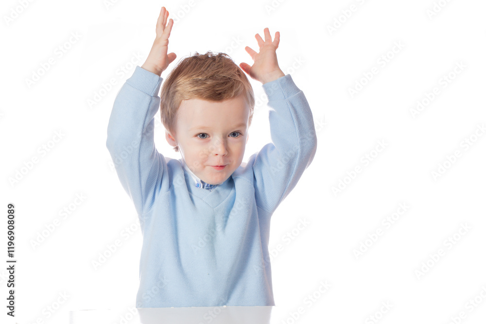 Emotional baby in shirt and blue jumper on white background Emotional baby in shirt and blue jumper on white background
