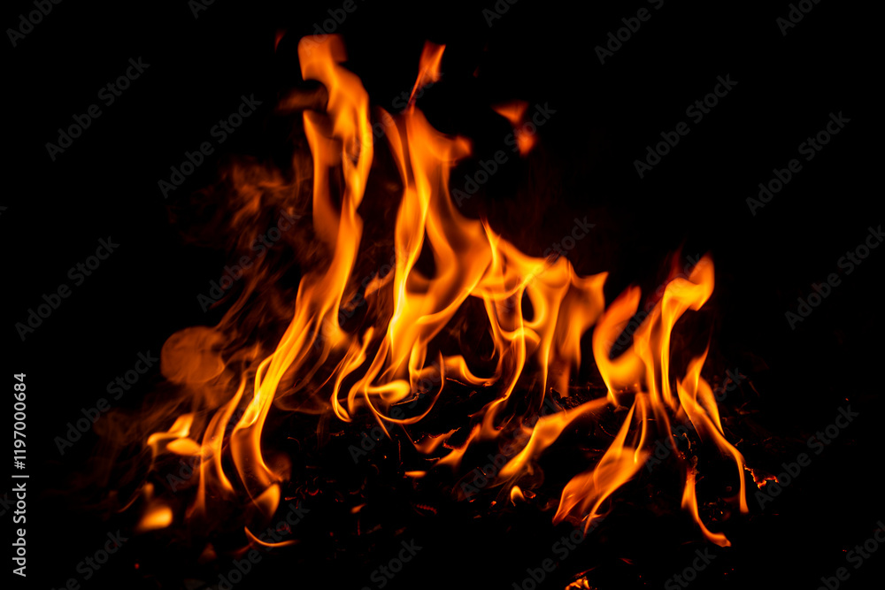 Fire flame background. Fire flames. Campfire texture. Flaming bonfire. Fire wallpaper. Bonfire background with copy space. Blaze fire flame texture background.