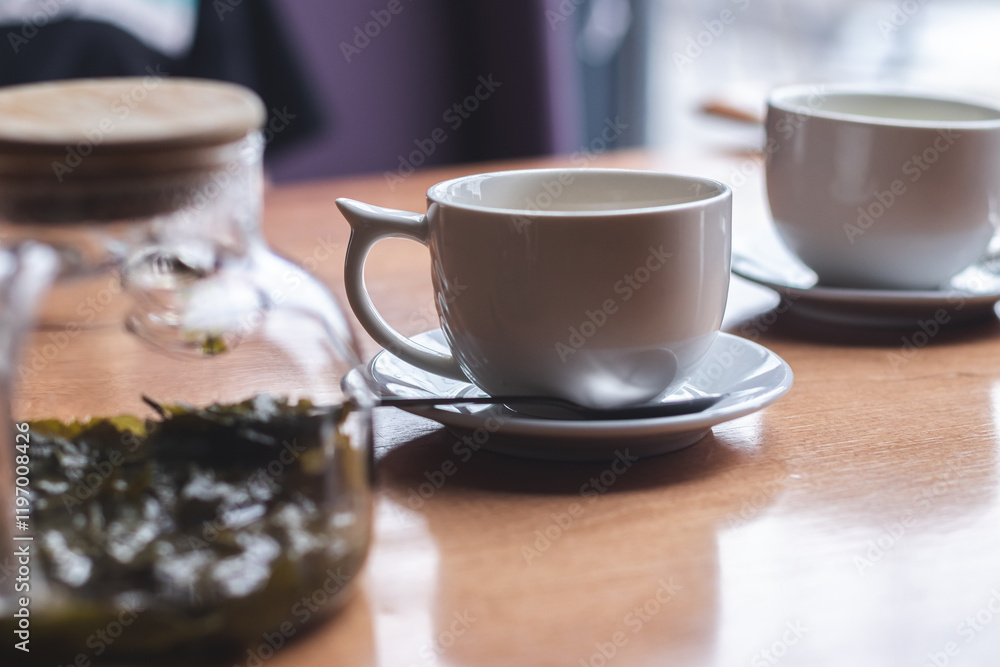 Fototapeta premium Concept of drinking tea in a cafeteria
