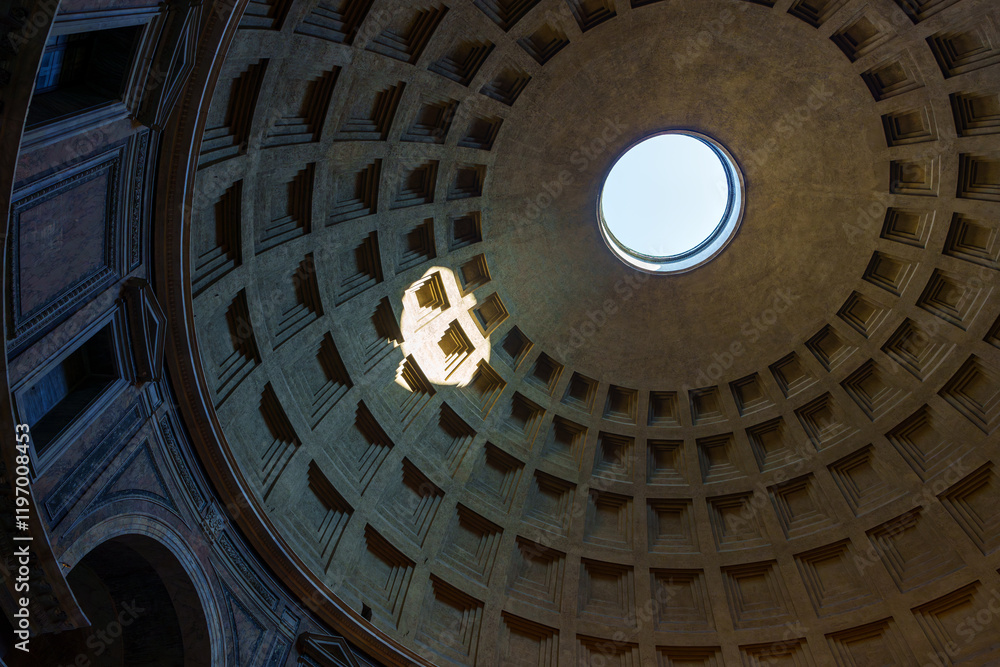 Sunlight beams through the oculus of the Pantheon in Rome, illuminating the coffers of its magnificent dome Sunlight beams through the oculus of the Pantheon in Rome, illuminating the coffers of its magnificent dome