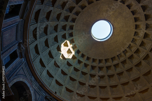 Photography Sunlight beams through the oculus of the Pantheon in Rome, illuminating the coff
