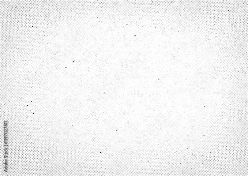 Vector halftone dot pattern with a smooth gradient effect. Subtle vignette effect with fading black dots on white background.