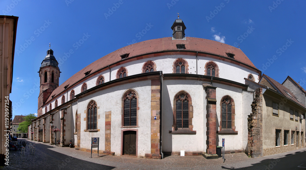 Naklejka premium Panoramic view of the gothic collegiate church with its nave and bell tower in the old town of Landau, Pfalz region in Germany