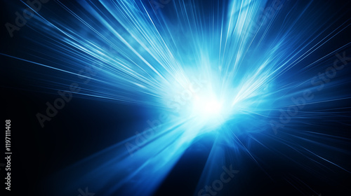 Blue energy burst with light rays on dark background