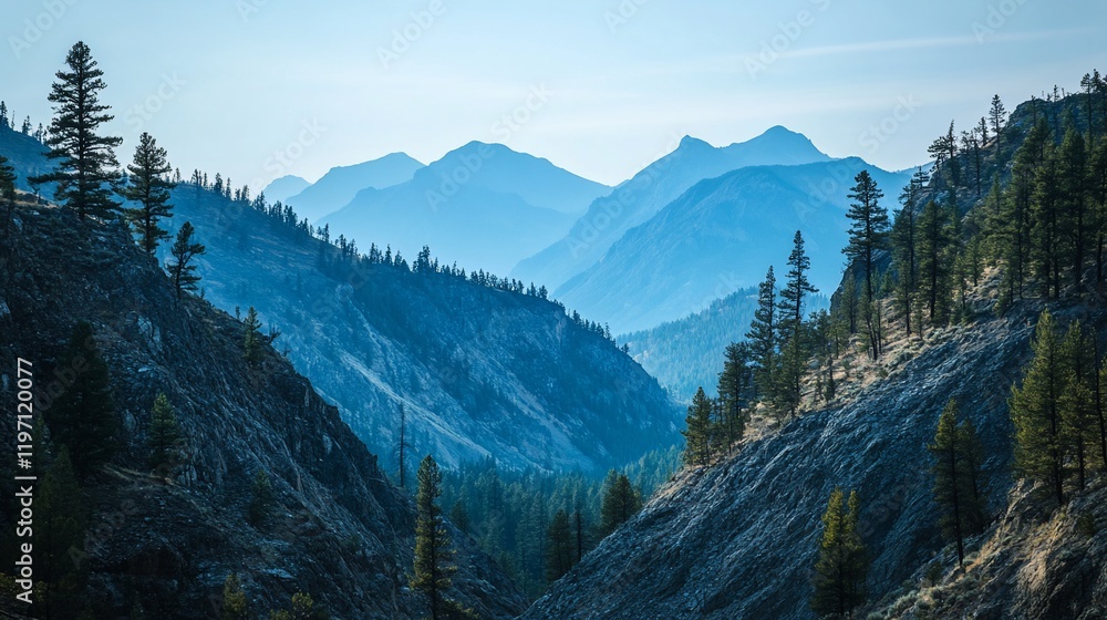 Fototapeta premium Majestic mountain range, hazy valley, serene landscape, nature background, ideal for travel brochures