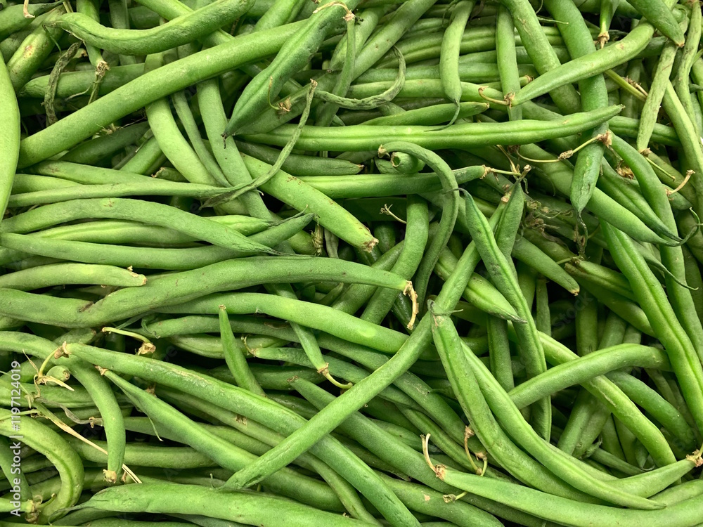 A bunch of green beans isolated against white background A bunch of green beans isolated against white background
