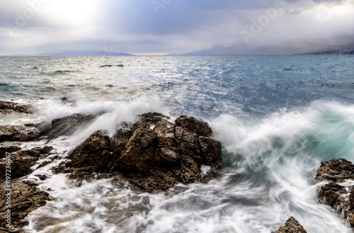 Obraz na płótnie Long exposure of waves on the coast of Croatia in the evening mood w salonie