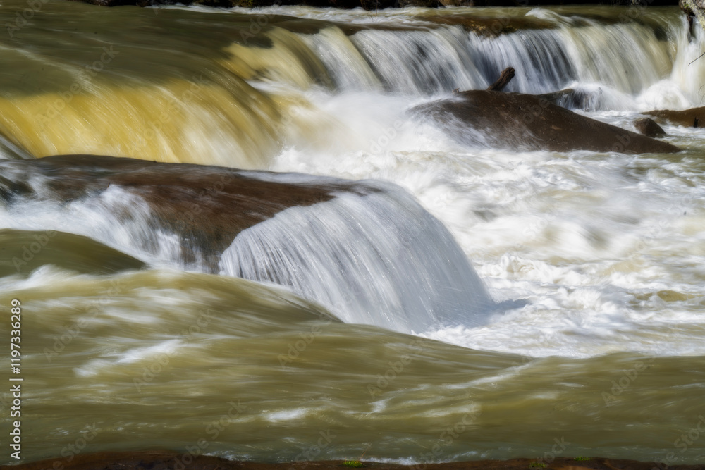 Fototapeta premium Close up wateralls flowing over the rocks