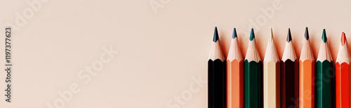 Linearly lined pencils on a light background – minimalism in the office photo