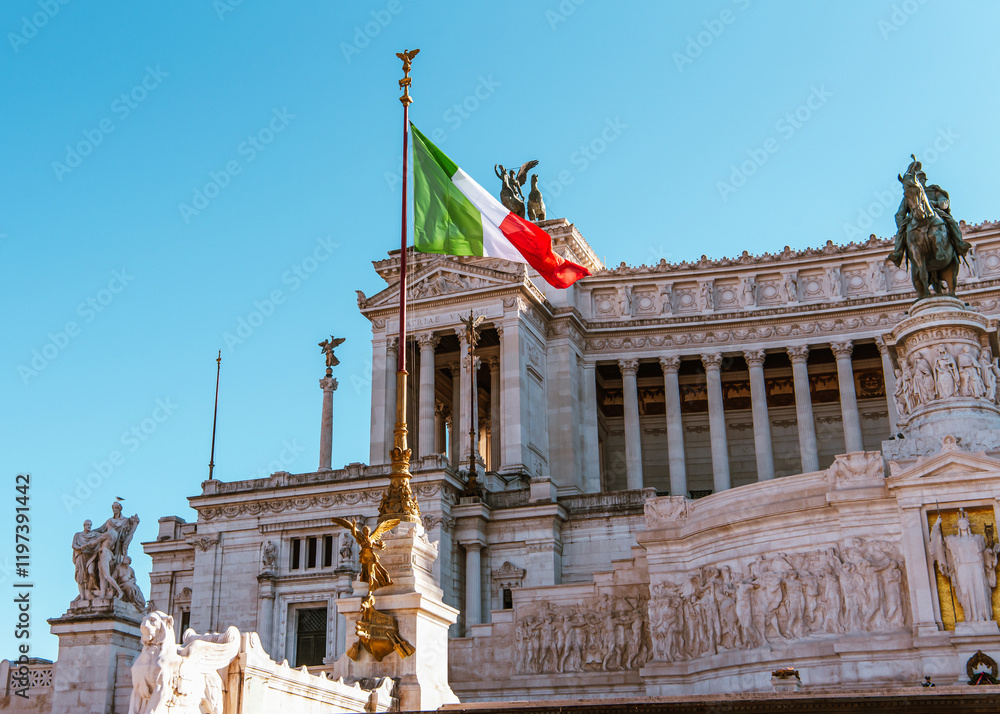Italian flag waving in front of the Vittoriano