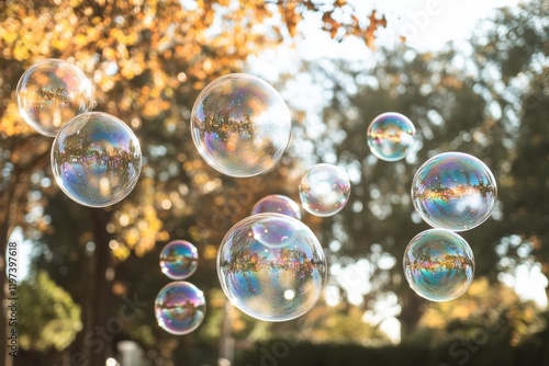 Hanging glass spheres illuminated with warm light create a stunning visual di...
