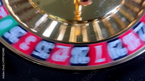 Roulette wheel spinning in casino, number 7 wins, winning and jackpot concept