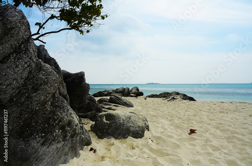 Rocky beach in Tanjung Gelam, Karimun, Java, Indonesia photo