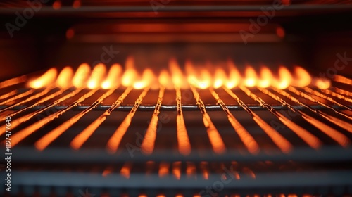 Close-up view of flames inside a gas oven with grilling racks visible and warm orange hues illuminated, Copy Space