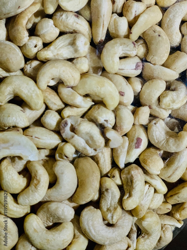 Full frame top view of huge amount of raw tasty cashews Full frame top view of huge amount of raw tasty cashews