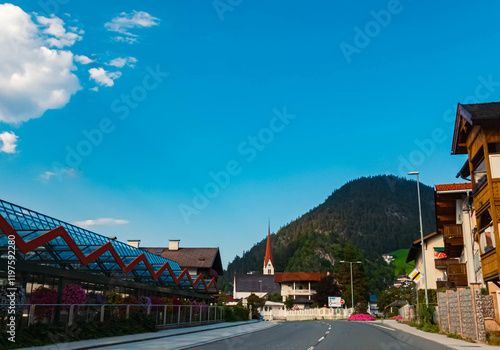 Alpine summer view with a church at Brixlegg, Kufstein, Rattenberg, Tyrol, Austria photo