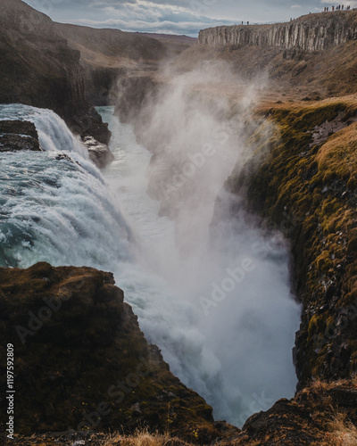 Breathtaking view of Gullfoss waterfall plunging into a deep canyon in south Iceland.