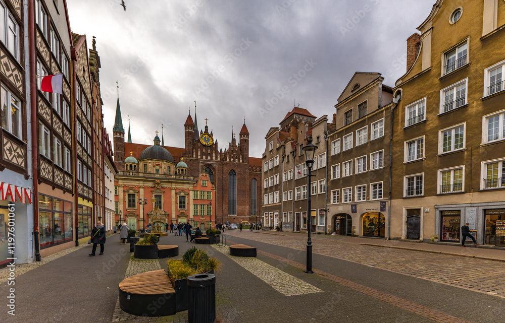 Fototapeta premium The center of the old town of Gdańsk, a walk along the Motlawa River, historic tenement houses, a market,
