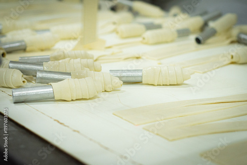  Traditional cake and sweet pastry. It is made from rolled dough, wrapped around a cylinder, Pastries Factory Vinica, Macedonia
 photo