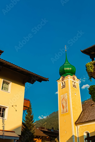 Church on a sunny summer day at Westendorf, Kitzbuehel, Brixental valley, Tyrol, Austria photo