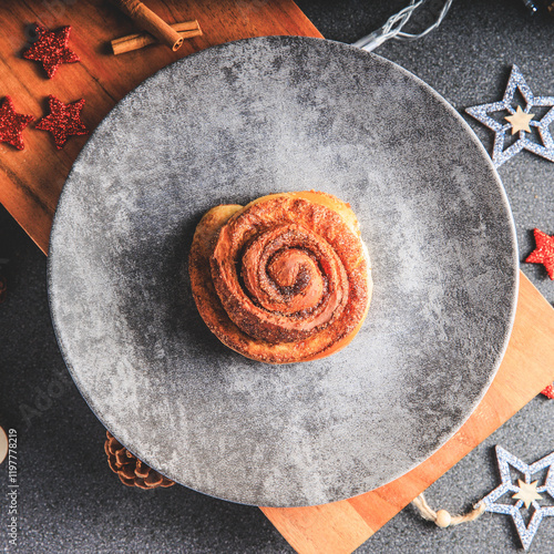 Obraz na płótnie Cinnamon Rolls brioches or cinnamon rolls with icing sugar and cream cheese - decorated for Christmas w salonie
