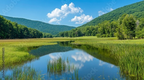 Serene Mountain Lake Reflecting Sky And Clouds
