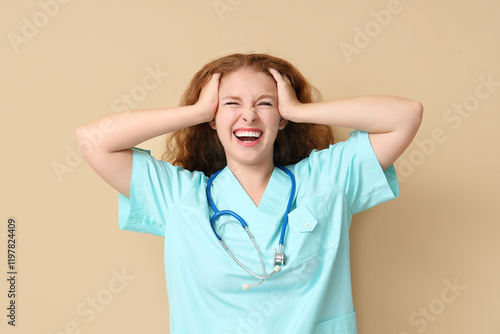 Happy female doctor on beig...