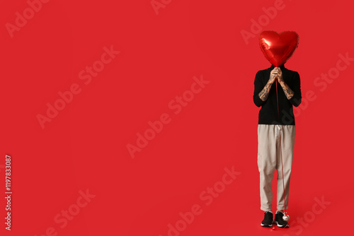 Man with air balloon in sha...