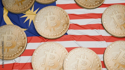 Several bitcoins are laid out on the flag of Malaysia