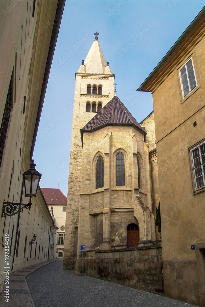 Fototapeta premium historic street in Prague with the church