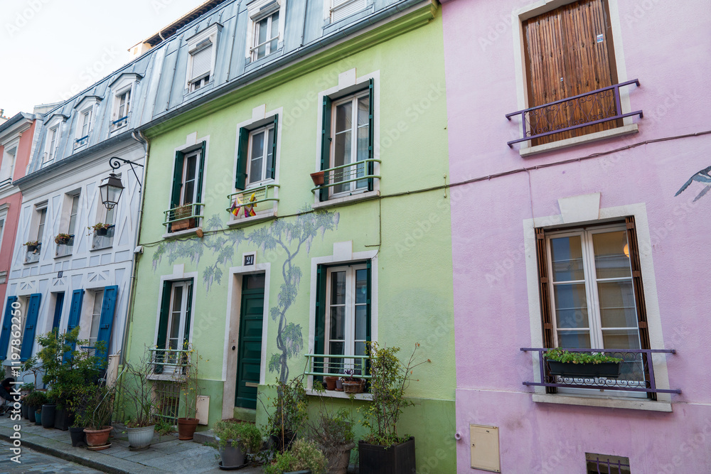 Colorful buildings line a charming street in a vibrant neighborhood Colorful buildings line a charming street in a vibrant neighborhood