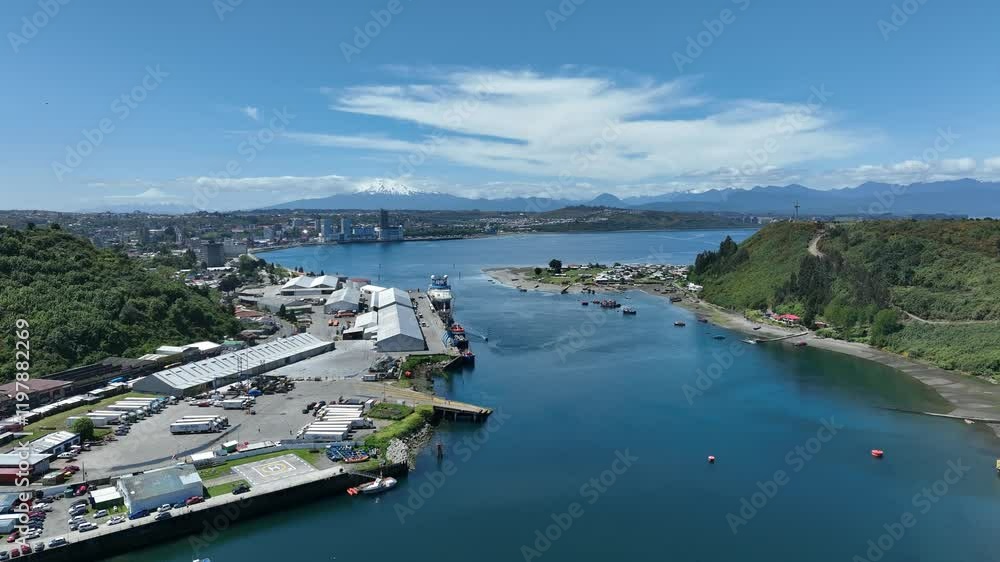 Aerial View of a Hilltop Cross Overlooking a Bay and Mountains Aerial View of a Hilltop Cross Overlooking a Bay and Mountains