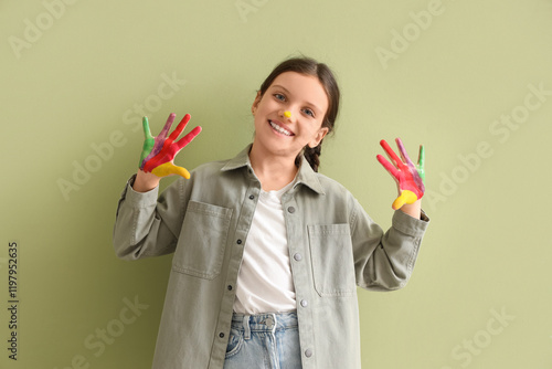 Cute girl with her hands in...
