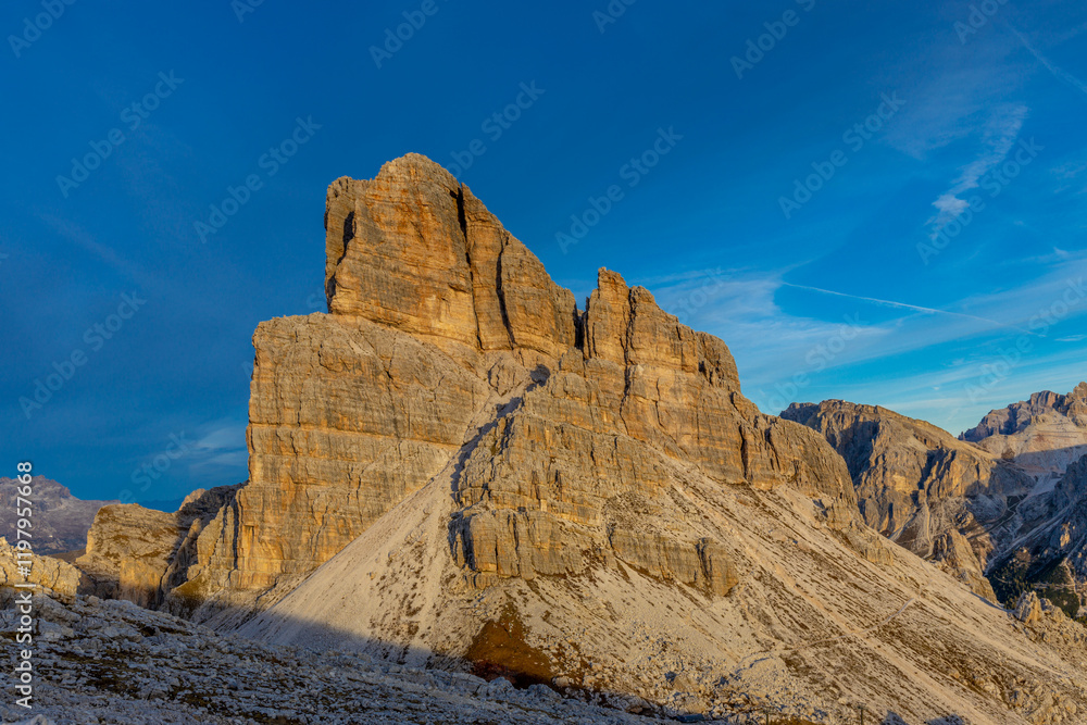 Fototapeta premium Averau mountain summit in the Dolomite Alps in Italy. Beautiful scenic alpine landscape of a rocky peak in the Dolomites in the morning sunlight