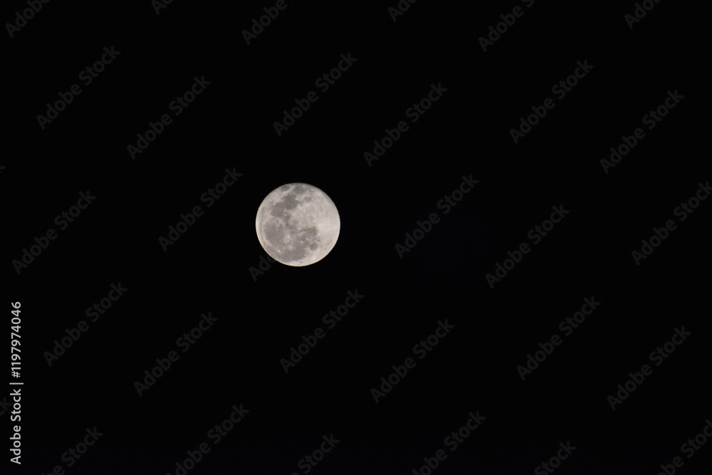 Beautiful Full Moon glowing up above the sky Beautiful Full Moon glowing up above the sky