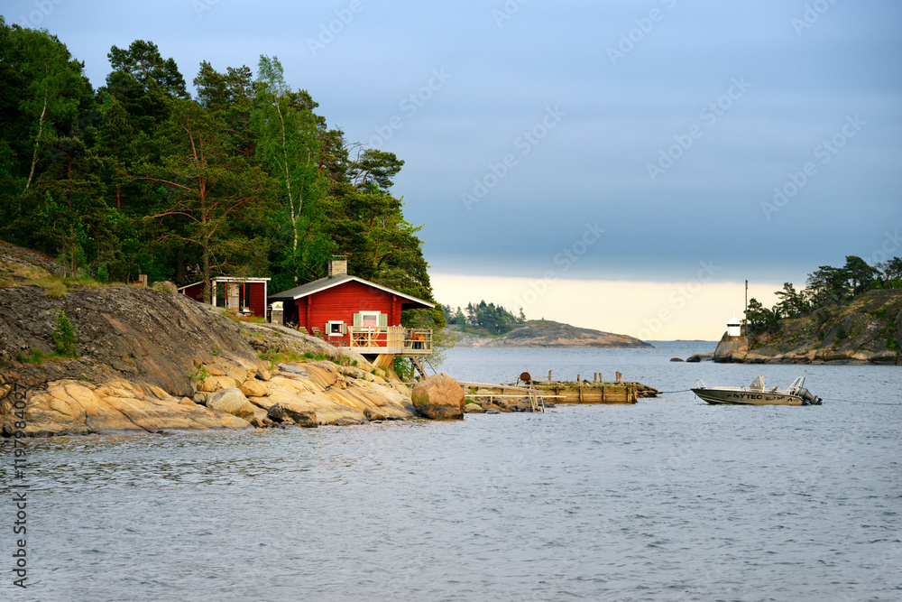 Helsinki, Finland. Summer house sauna with boat landing on coast on east side of Helsinki